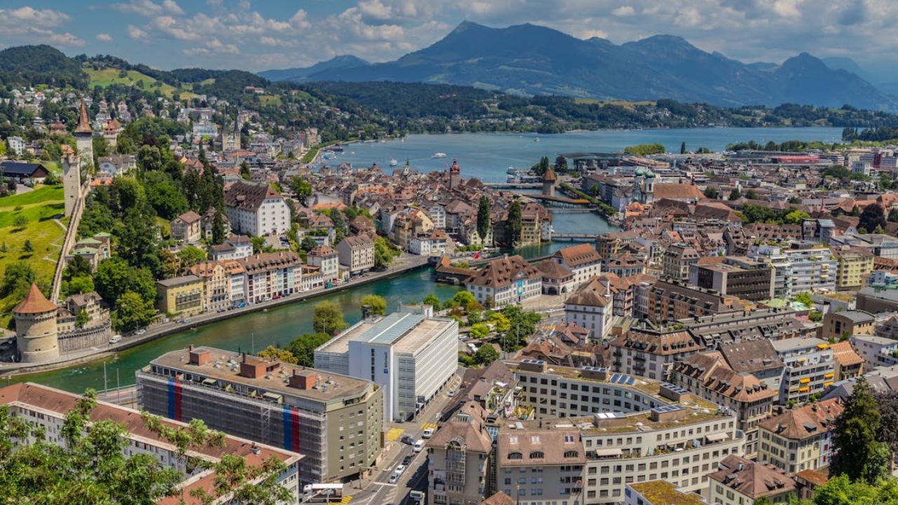 Aerial view of Lucerne, Switzerland with Lake Lucerne and surrounding mountains.