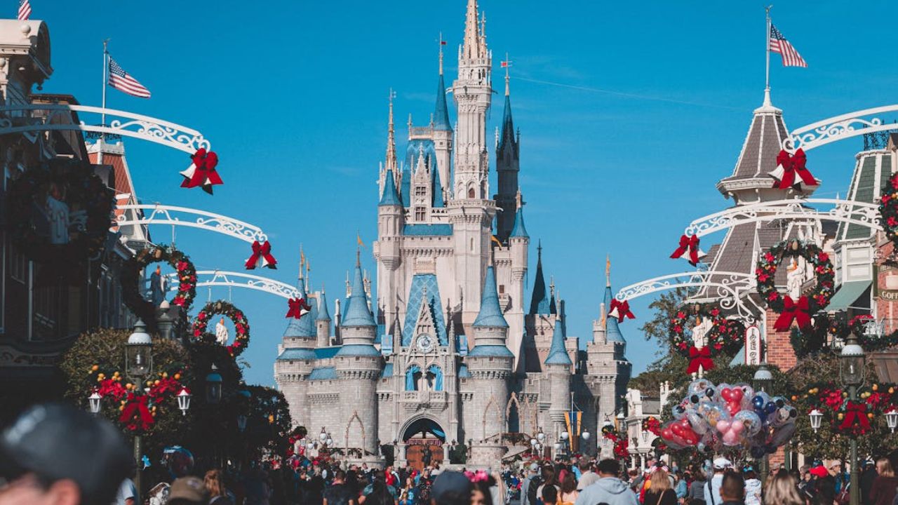 Holiday crowd at Magic Kingdom with Cinderella Castle in Orlando, Florida.