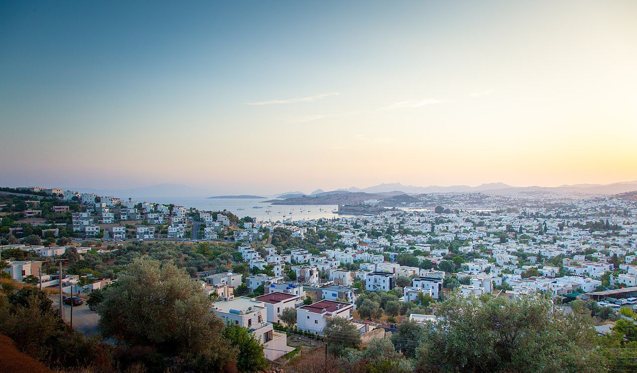 Sunset view of Bodrum, Turkey with whitewashed houses and Aegean coastline