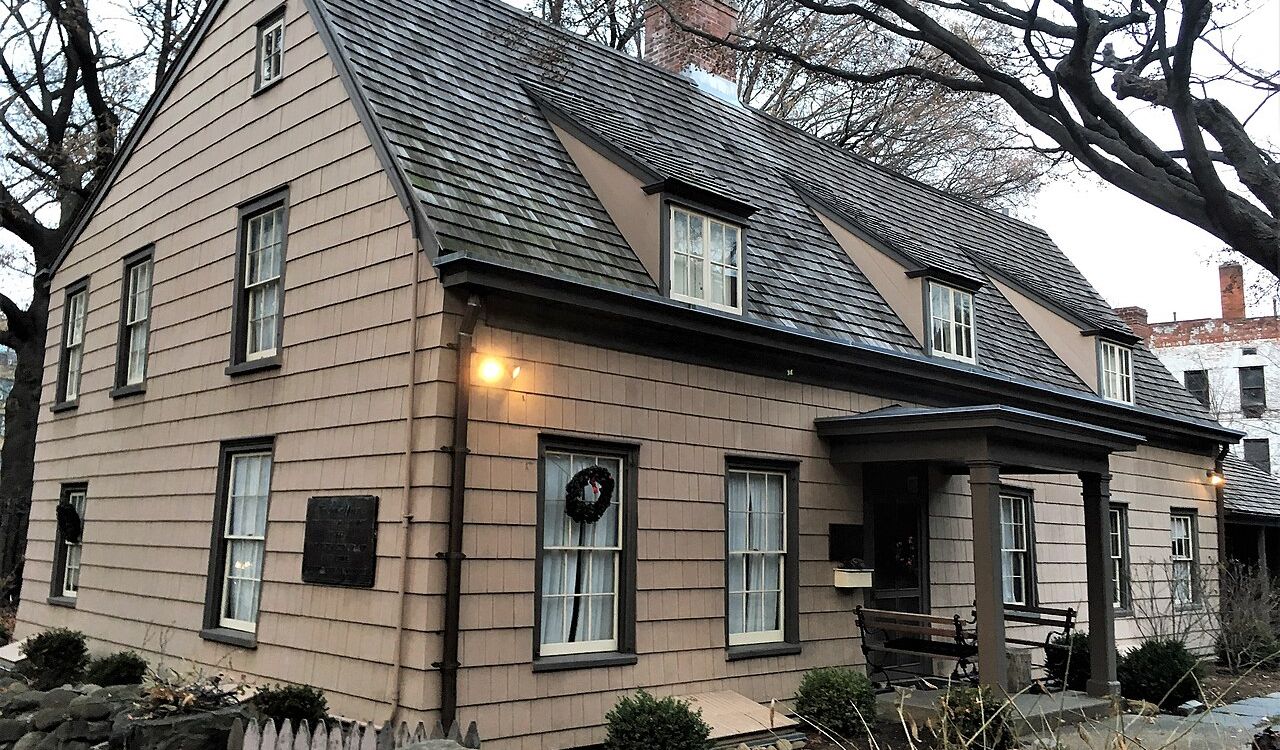 Historic wooden house with pitched roof