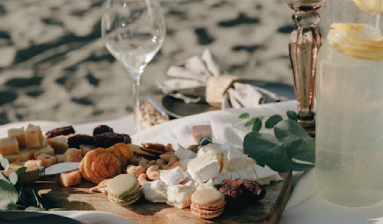 Assorted snacks and drinks set up for a beach picnic