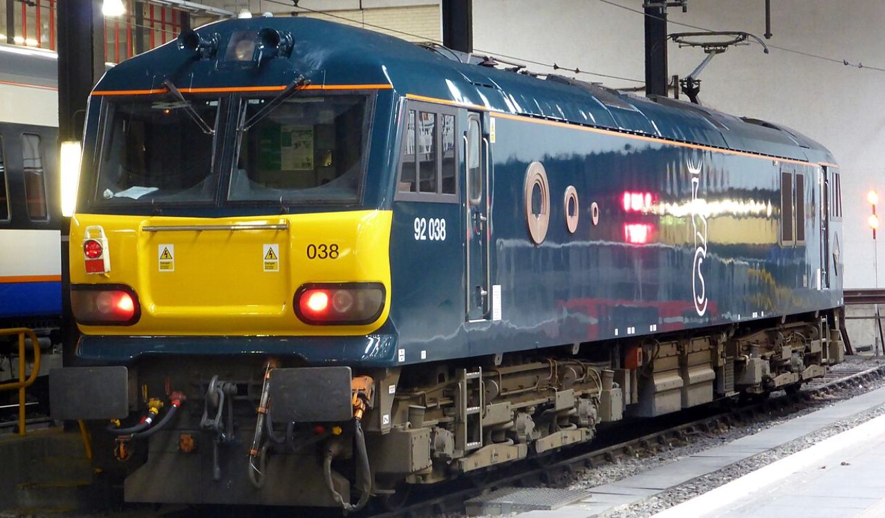 Caledonian Sleeper locomotive 92 038 at station platform