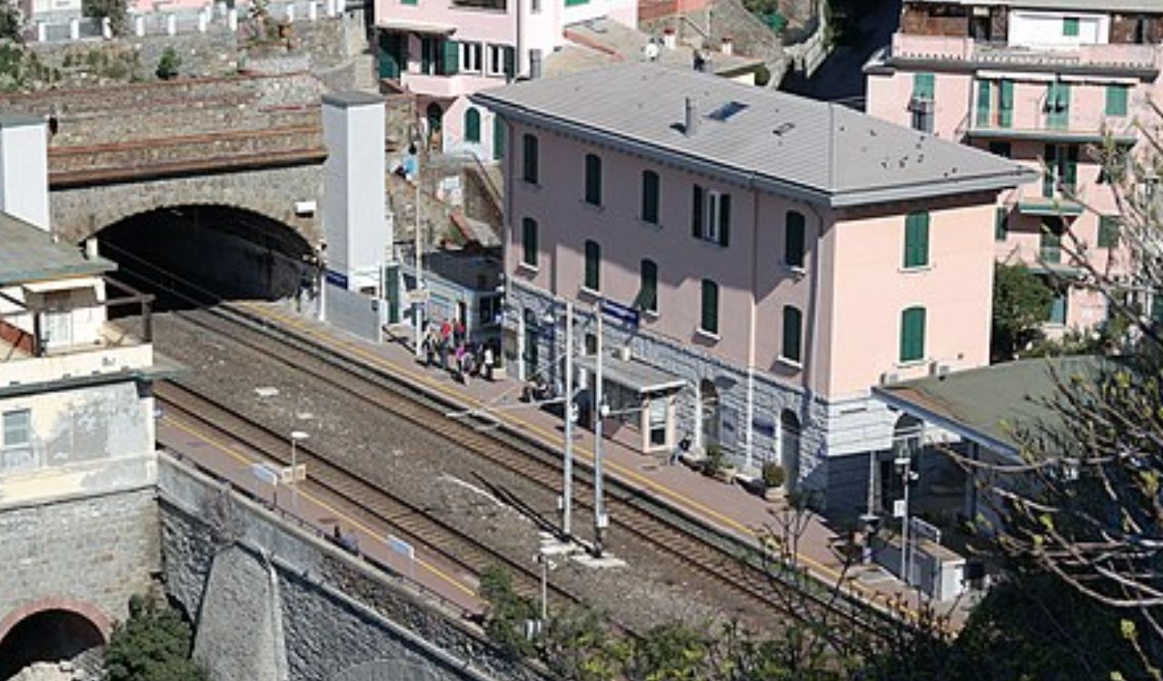 Cinque Terre railway station amid pastel hillside houses