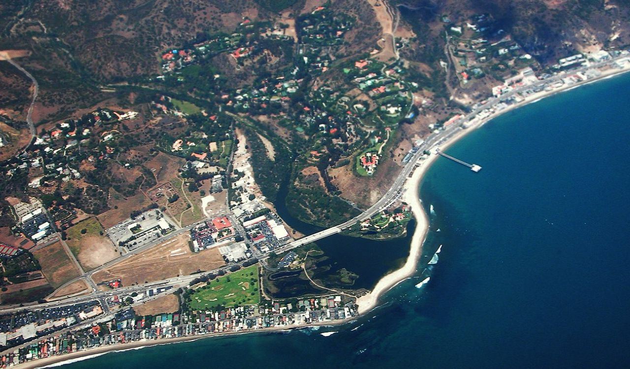 Aerial view of Malibu, California, showcasing its scenic coastline, beaches, and hillside homes