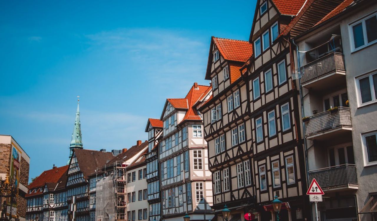 Colorful timber-framed buildings line a charming German street