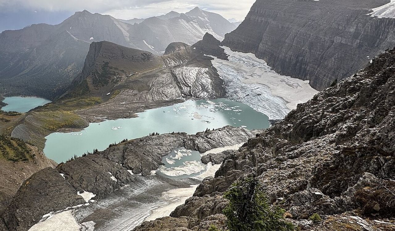 Grinnell Glacier with turquoise lakes and surrounding rocky peaks in Glacier National Park, Montana