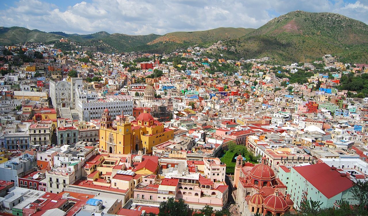 Colorful hillside cityscape of Guanajuato with colonial buildings and churches