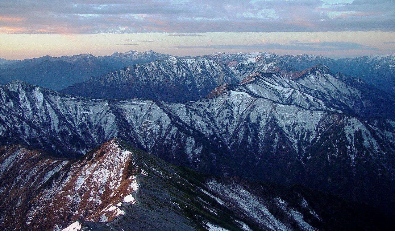 Snow-capped mountains of the Hida Takayama region in Japan during sunset