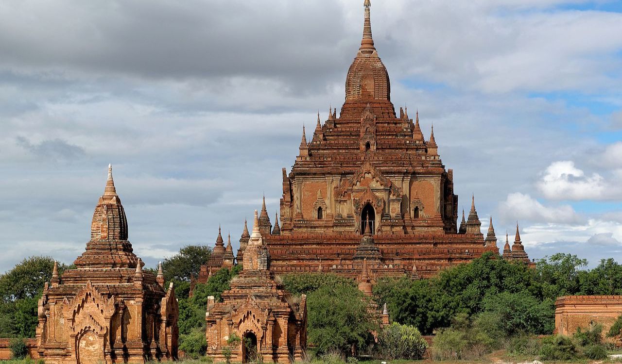 Htilominlo Temple rises in red majesty