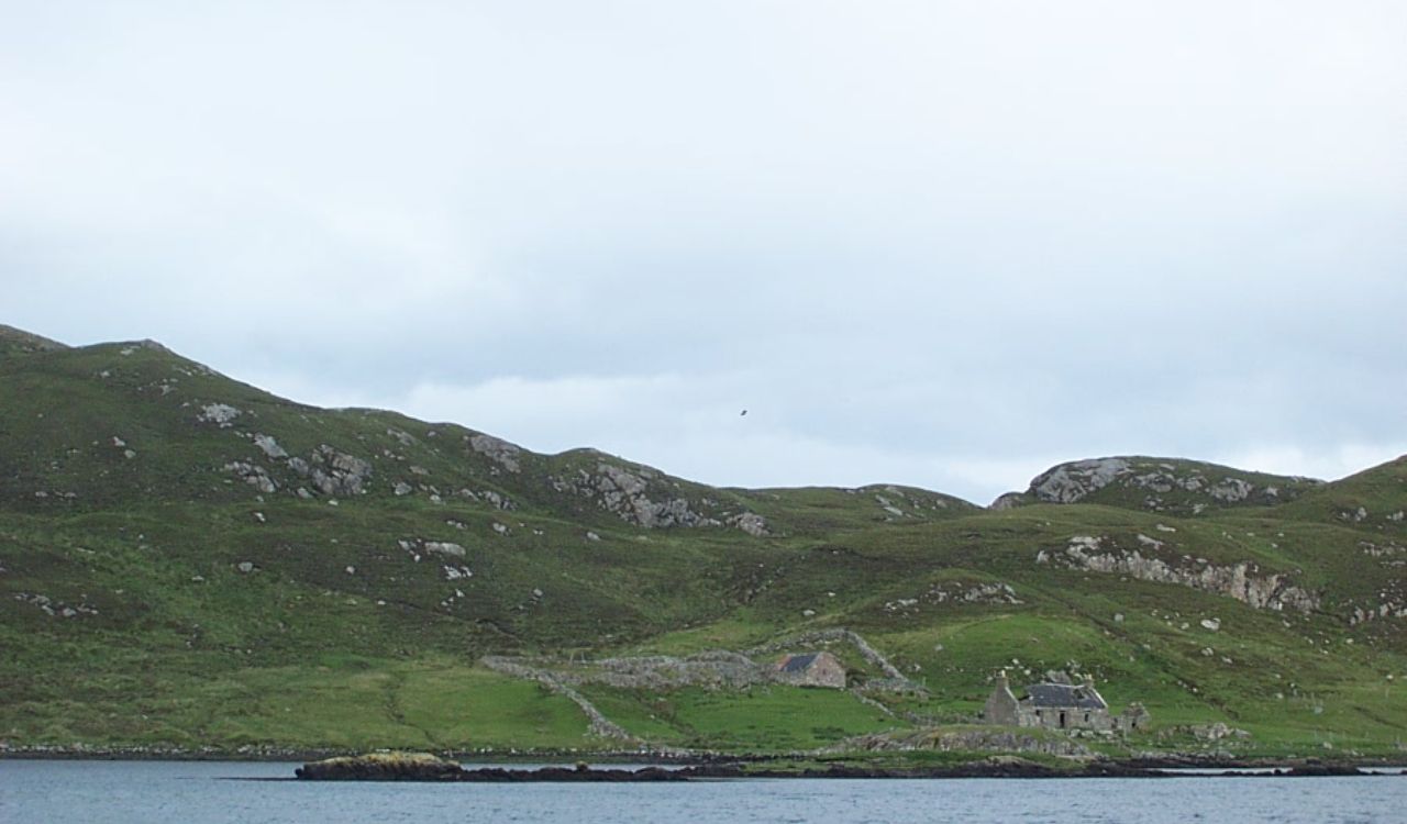 Green hills and stone cottage on the Isle of Lewis