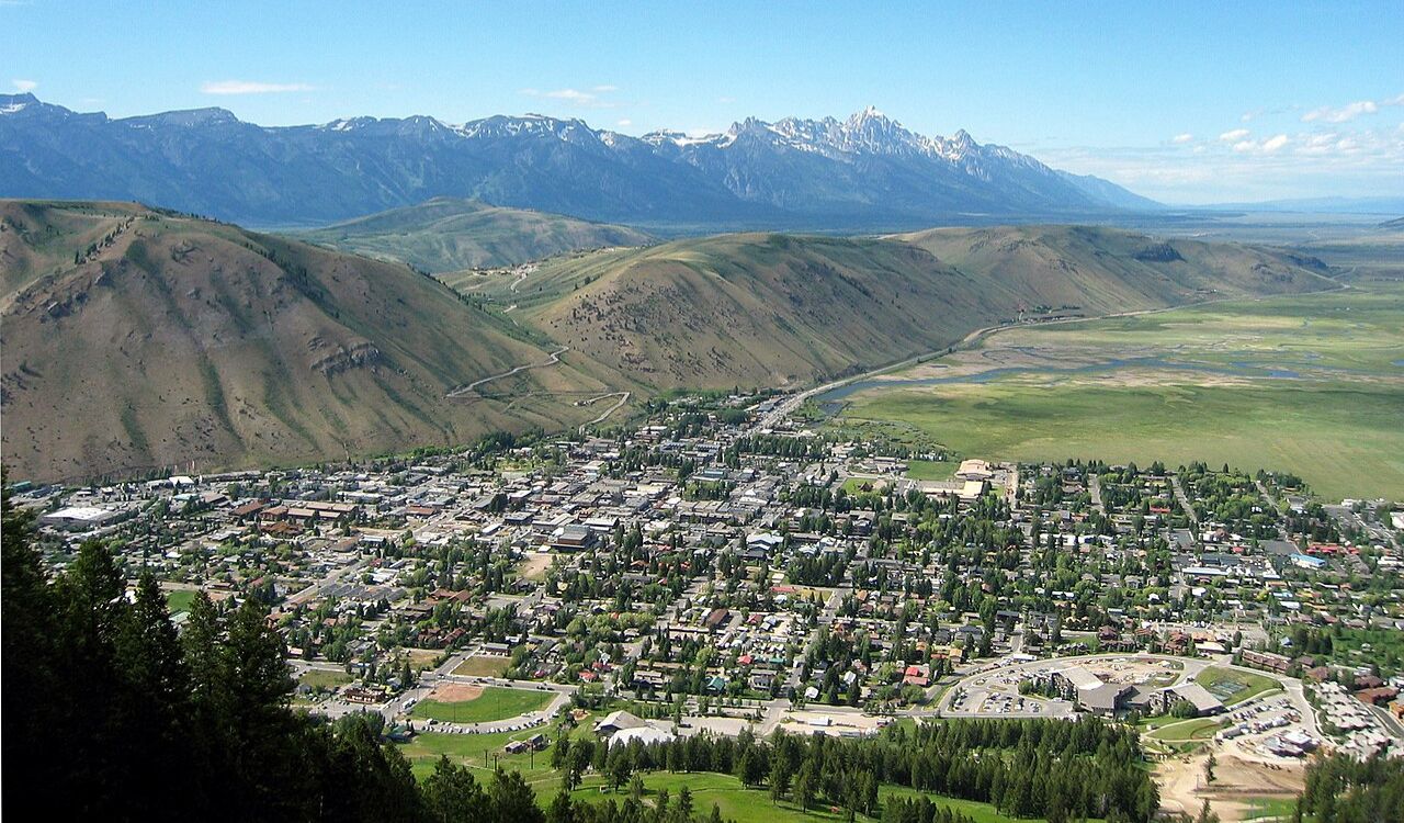 Aerial view of Jackson, Wyoming with Grand Teton mountain range in the background