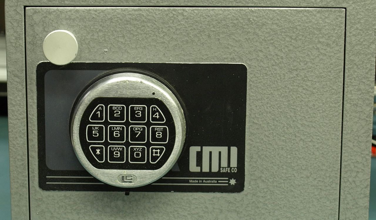 Digital keypad of a CMI safe used to securely store valuables.