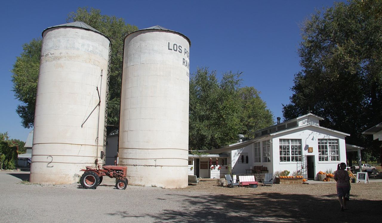 Twin silos and farmhouse at Los Poblanos Historic Inn in New Mexico
