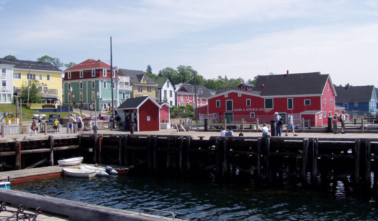 Lunenburg waterfront with colorful buildings and boats.