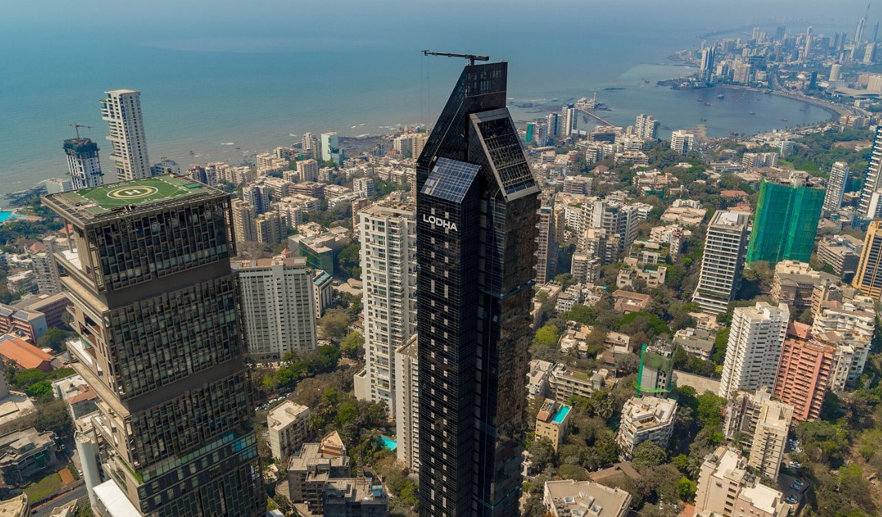 Aerial view of Mumbai skyline with tall skyscrapers near the coast