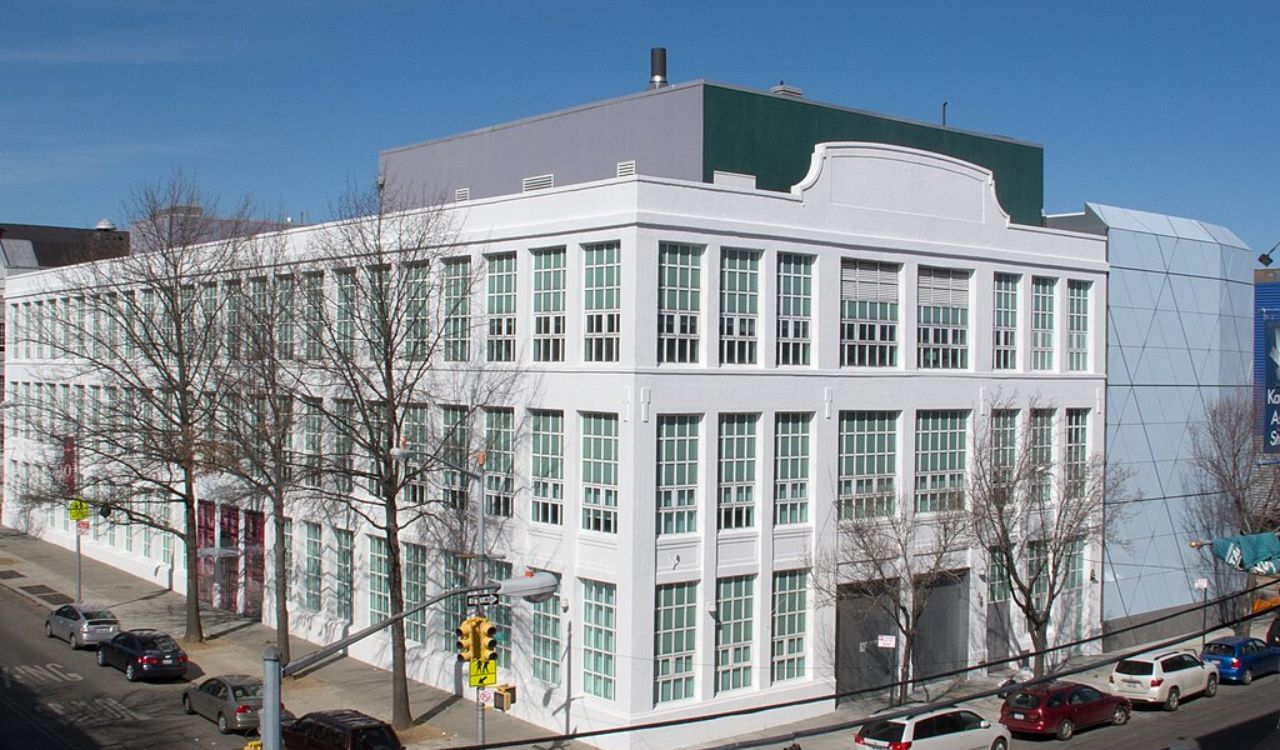 White museum building with large windows