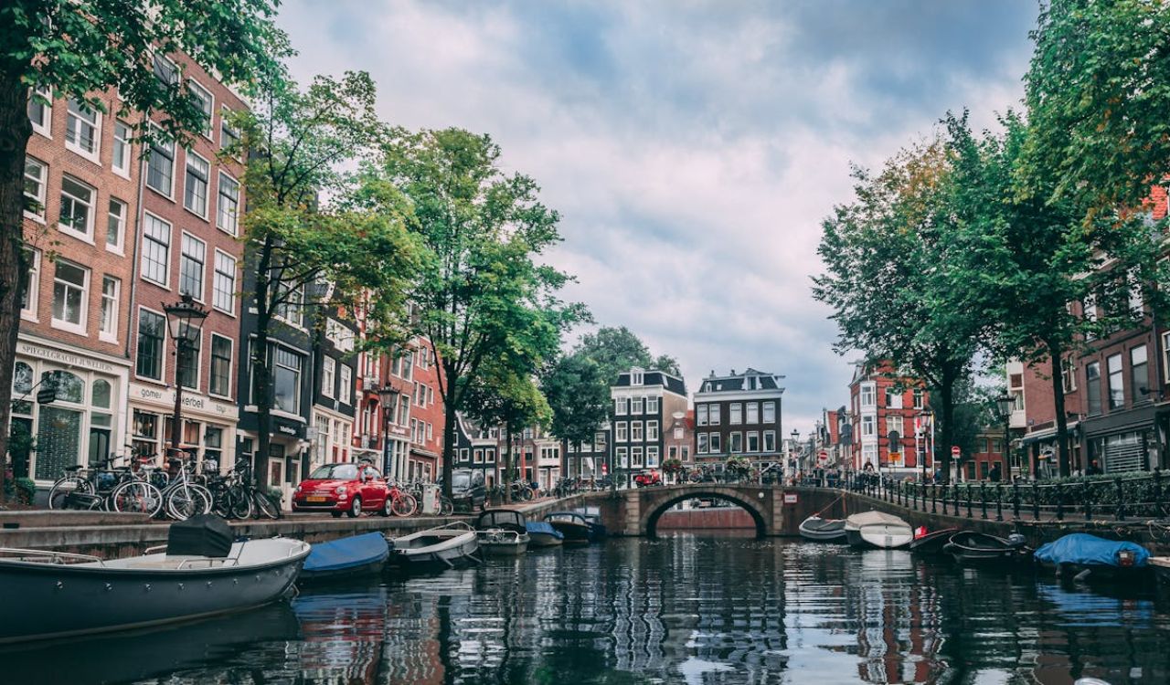 Charming canal boats and cozy streets define this Dutch scene