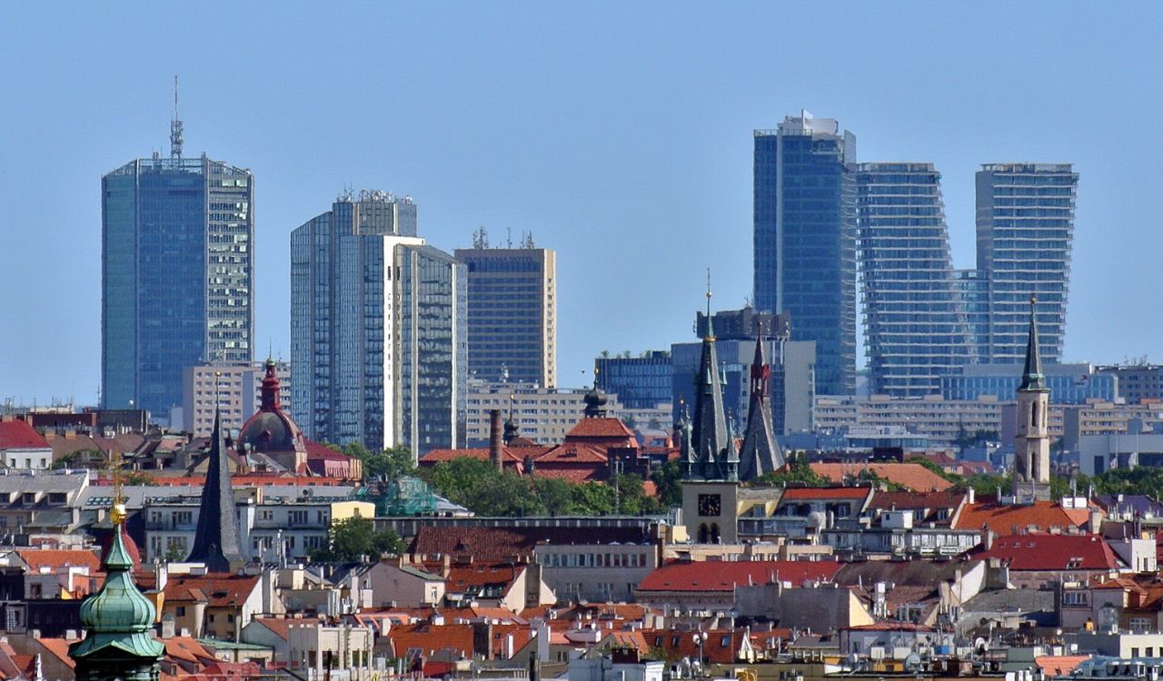 Skyline of Prague, Czech Republic with modern skyscrapers and historic rooftops