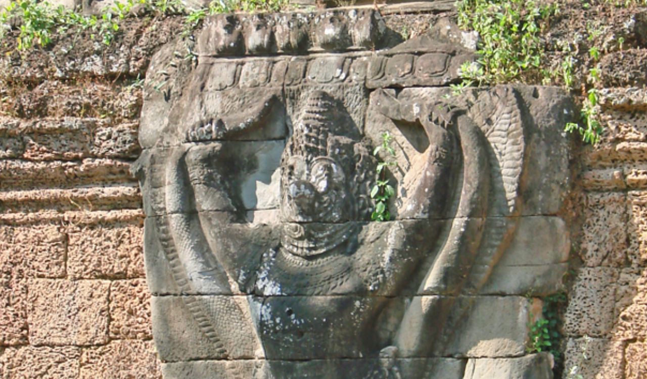 Stone carving of a deity at Preah Khan temple.
