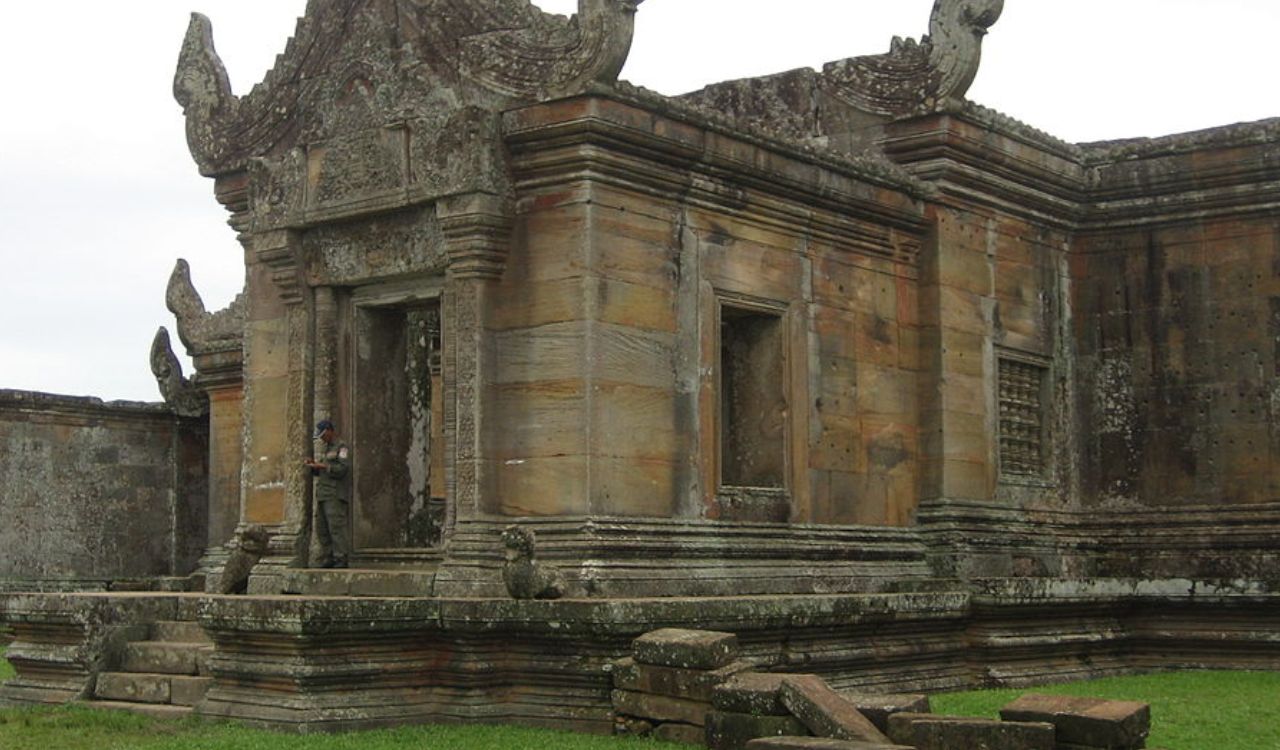 Preah Vihear temple with a visitor at the entrance.