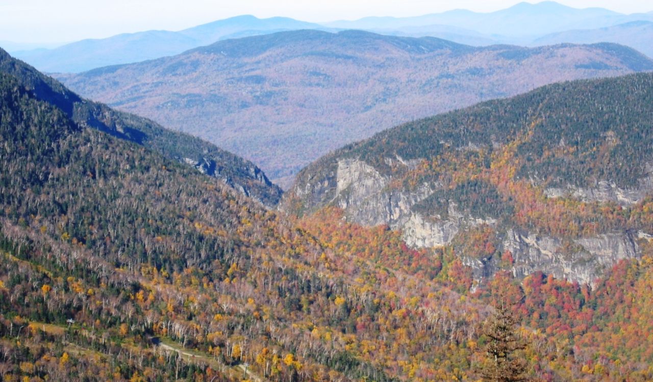 Smuggler’s Notch, Vermont, with rugged cliffs and vibrant autumn foliage