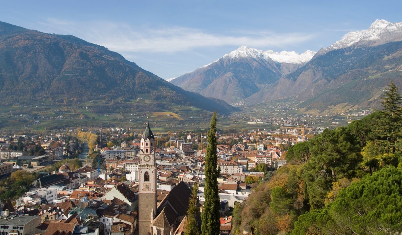 South Tyrol town in northern Italy with snow-capped Alps in the background