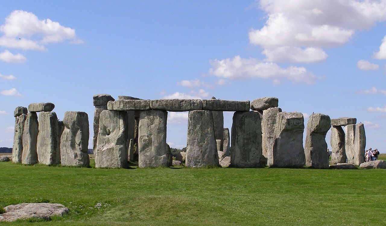 Stonehenge prehistoric stone circle under a partly cloudy sky in England