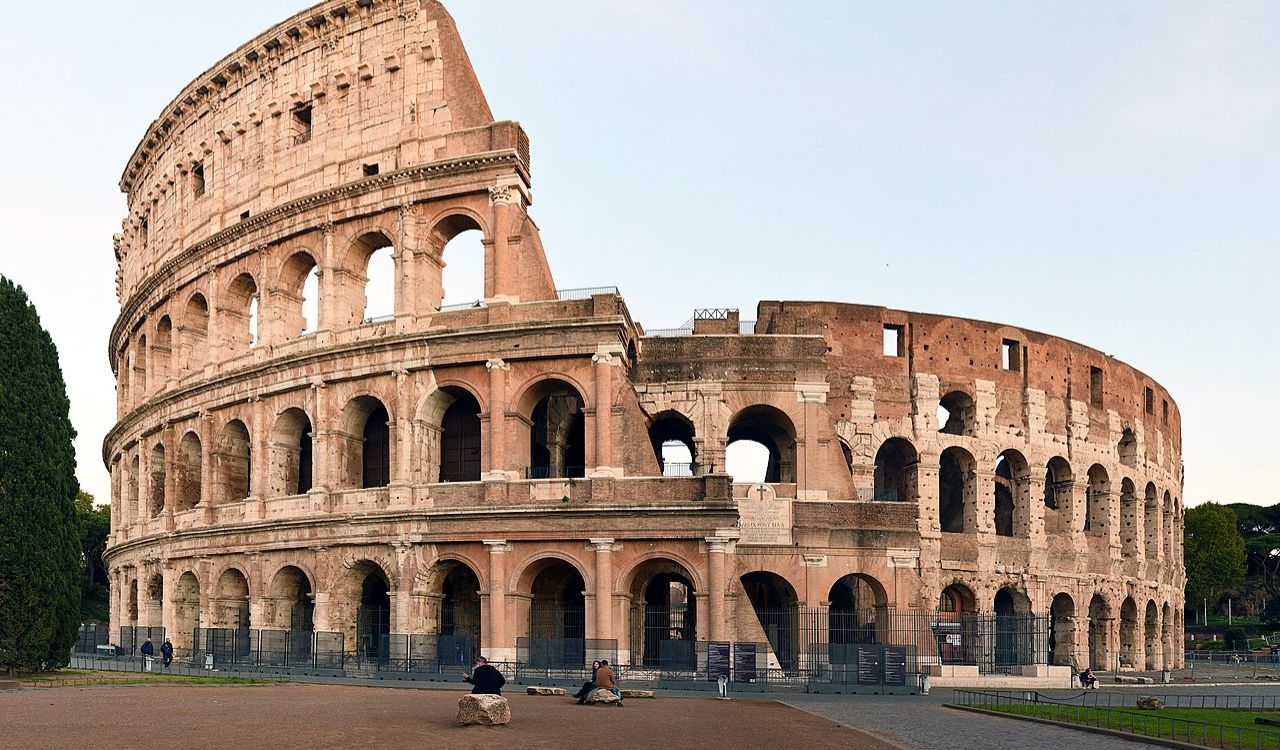 The Colosseum in Rome, Italy, ancient Roman amphitheater at sunset