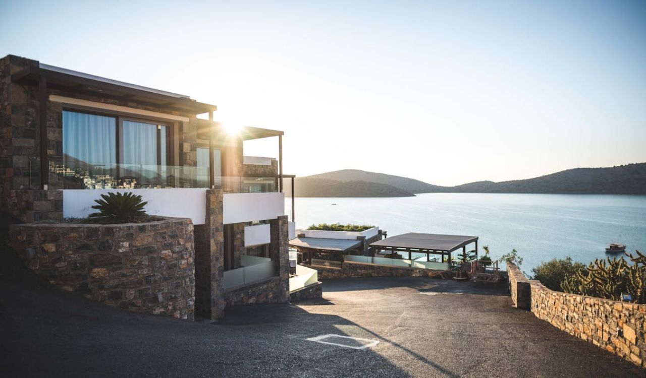 The Glass House on Lake Travis offers sleek luxury with sweeping water views—ideal for couples craving modern comfort and scenic serenity