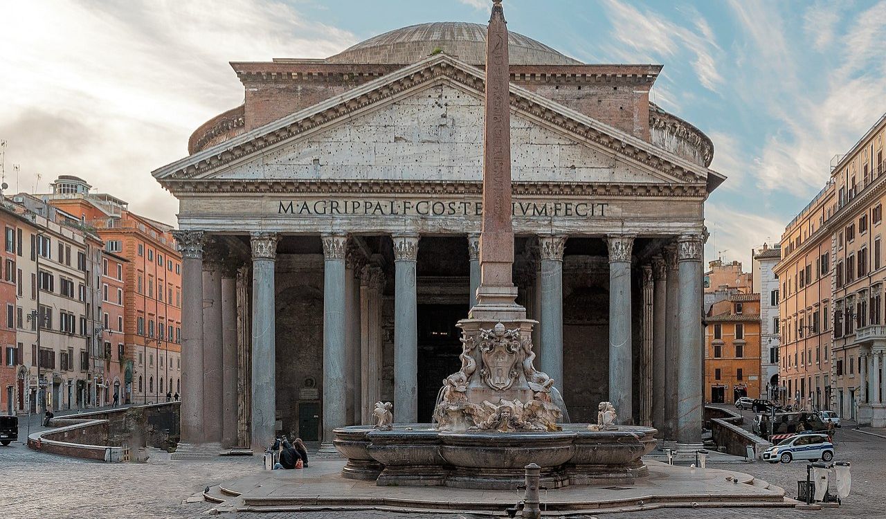 Pantheon in Rome with fountain and obelisk, showcasing ancient Roman architecture