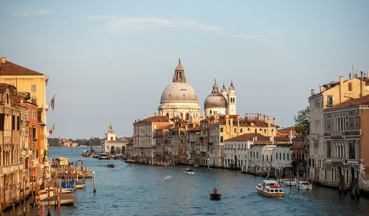 Scenic view of Venice Grand Canal with historic buildings and boats
