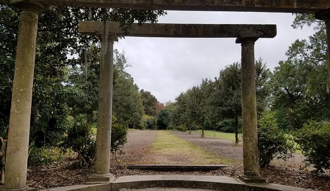 Stone columns and garden pathway at Airlie Gardens in Wilmington, North Carolina.