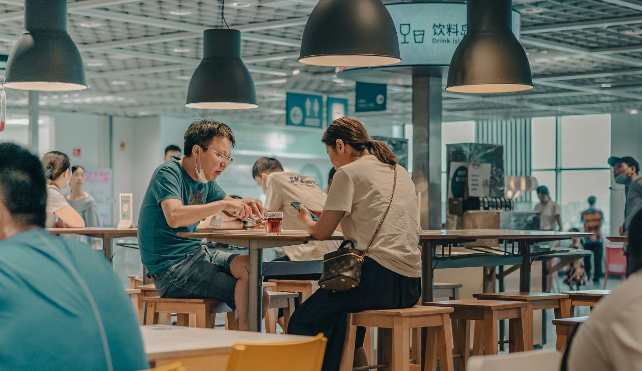 Traveler eating a light meal at an airport restaurant