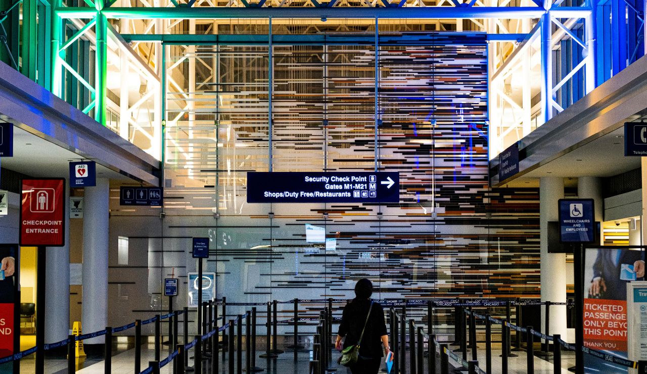 Traveler heading toward quiet side of airport security