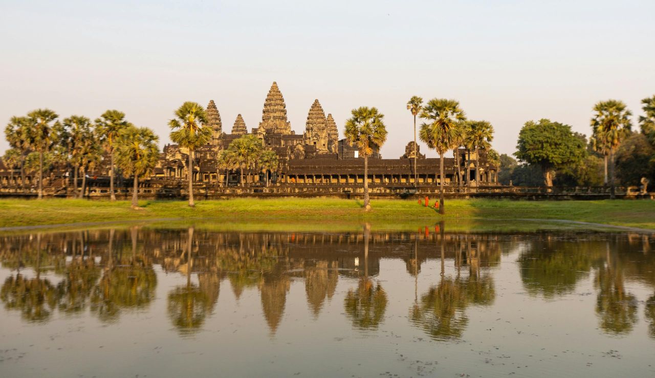 Angkor Wat temple at sunrise reflected in water