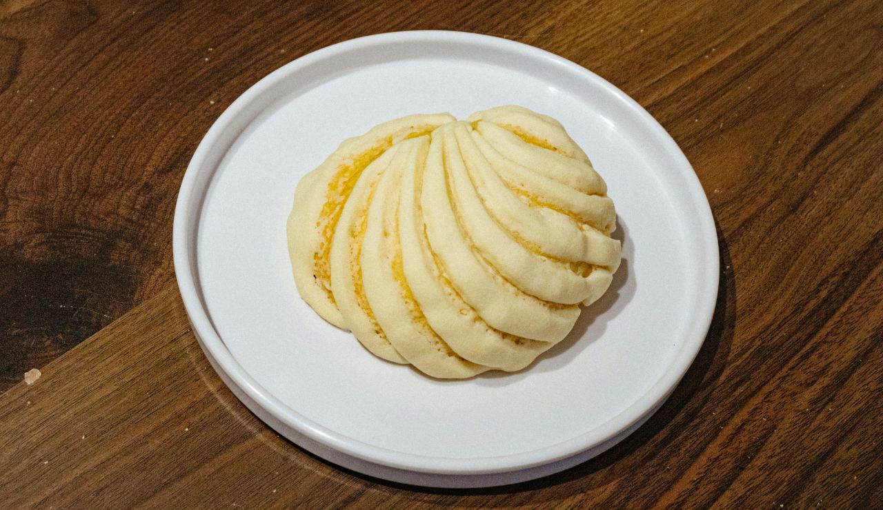 Baked apple dumpling with cinnamon and syrup