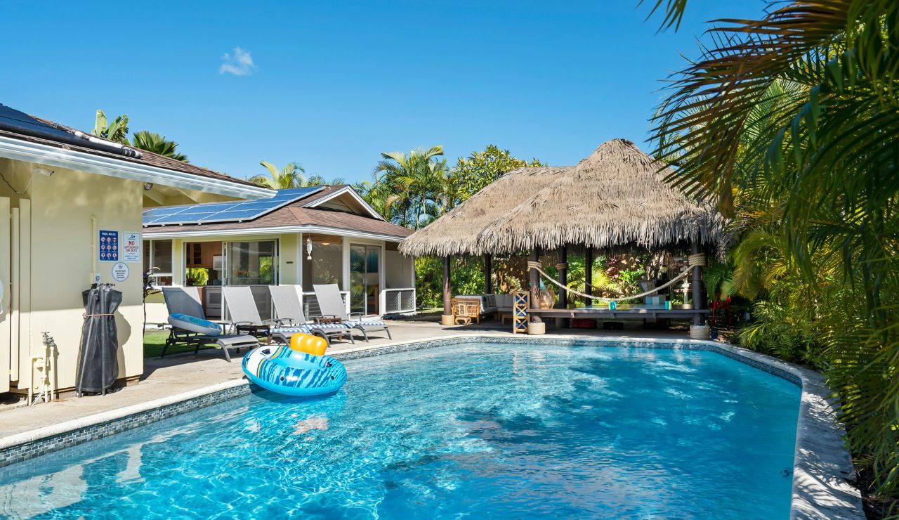 Private villa pool in Bali with floating breakfast, showcasing affordable luxury.