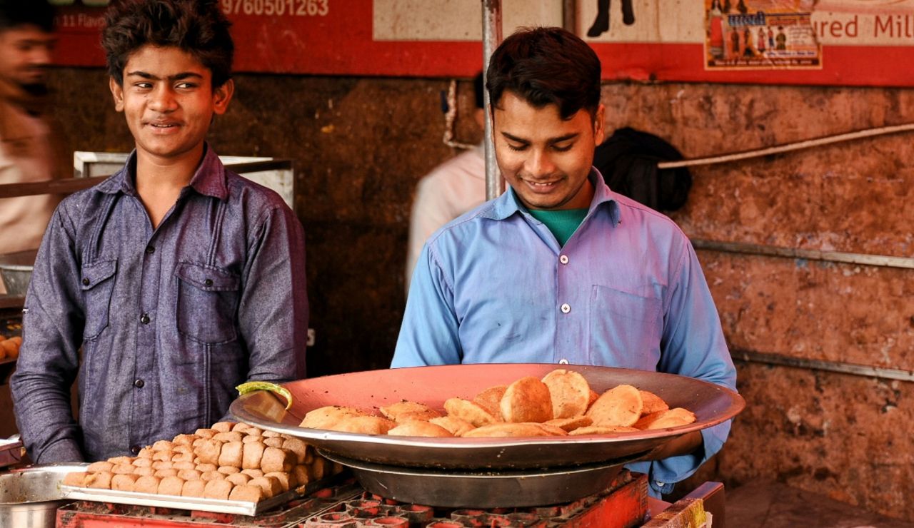Close-up of fuchka and jhalmuri at a street food stall