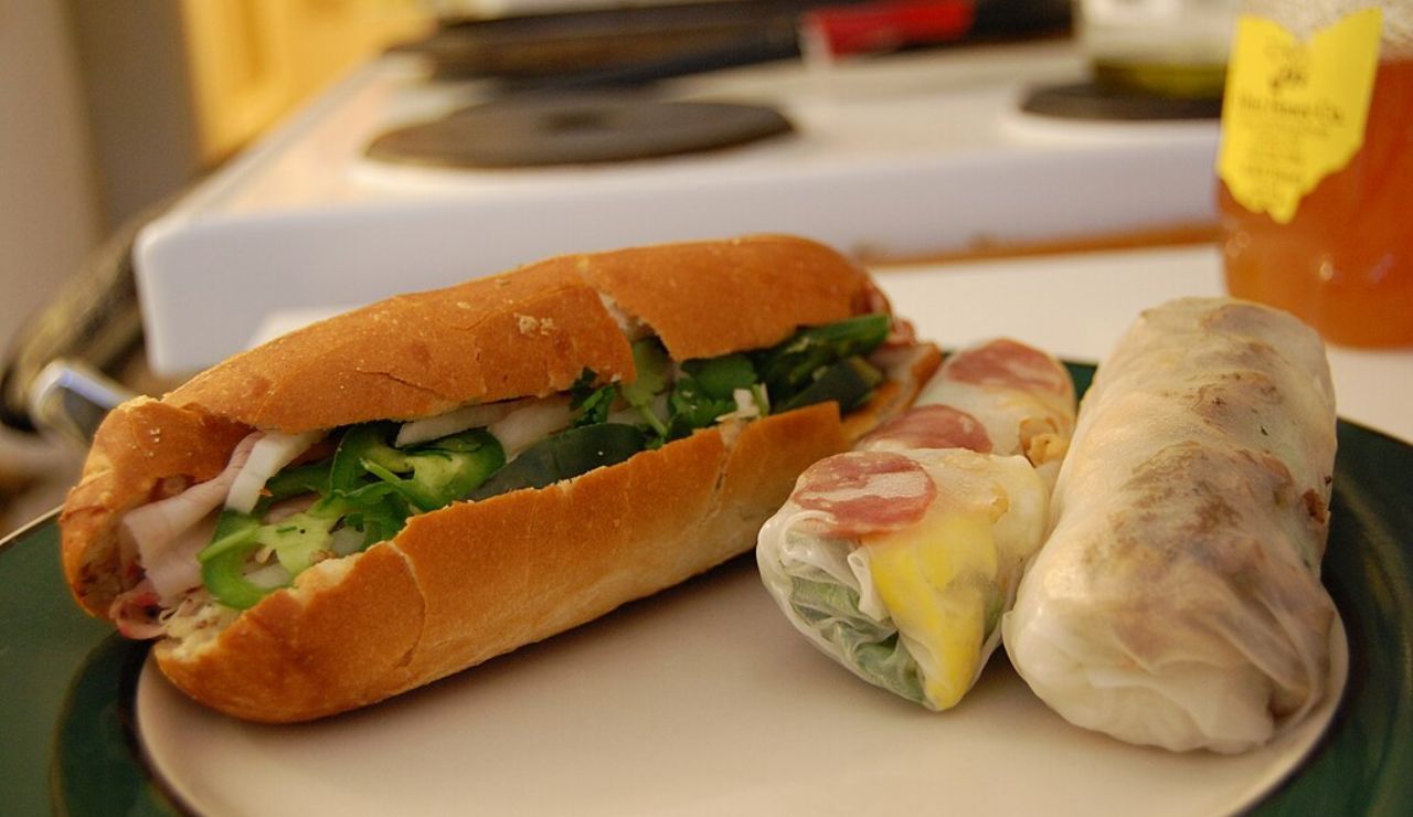 Bánh mì from Saigon Deli comes packed with fresh herbs, pickled veggies, and savory meats in a crispy baguette.