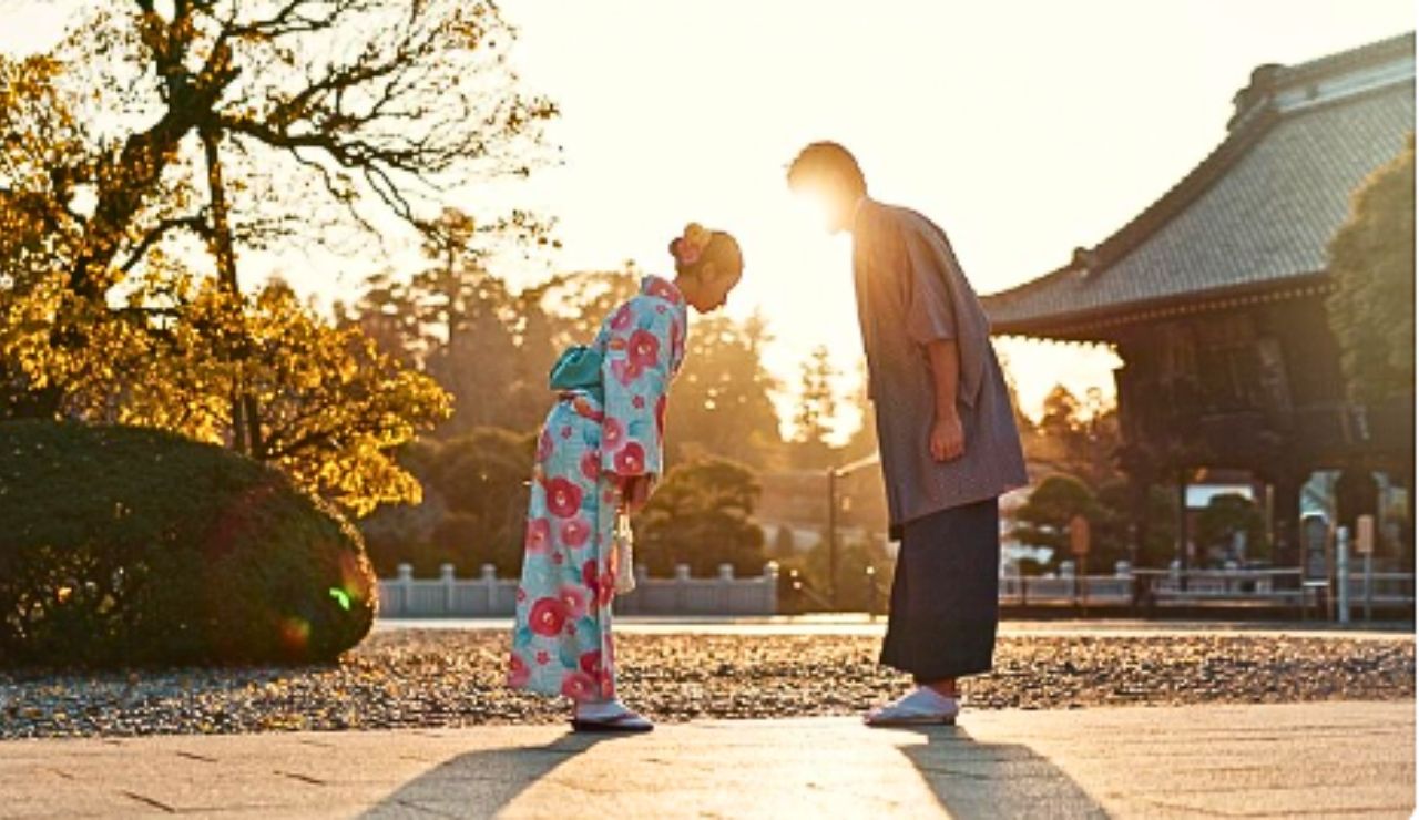Locals bowing in greeting instead of shaking hands or hugging