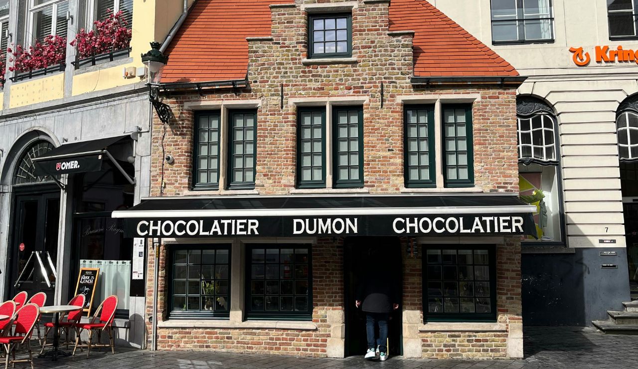 Chocolate shop and canal scene in historic Bruges