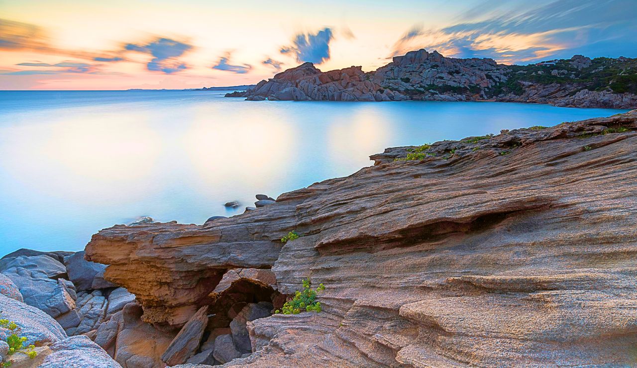 Rocky cliffs and coastal trail on Capraia Island, Italy