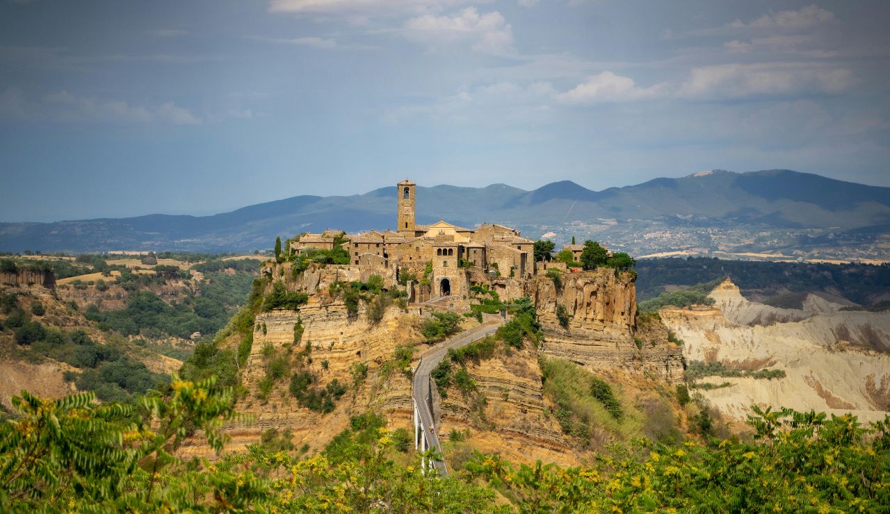 Stone bridge leading to Civita di Bagnoregio perched on a cliff in central Italy