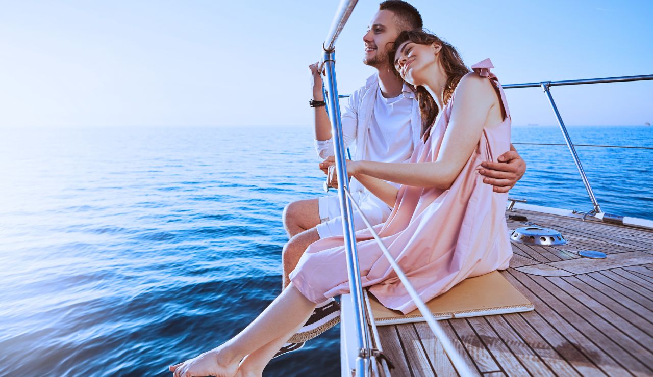 Couple enjoying a sunset boat ride on Lake Coeur d’Alene.”
