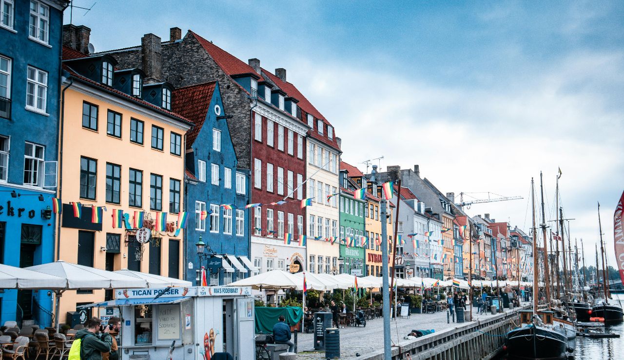Canal walkway with smørrebrød served at outdoor café in Copenhagen