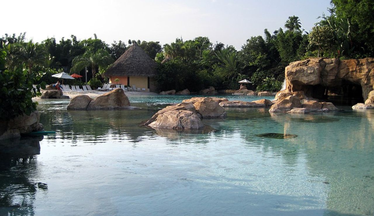 Tranquil tropical lagoon and cabanas at Discovery Cove in Orlando, Florida.
