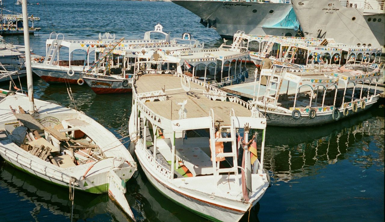 Boat tied at guest dock next to a waterfront seafood restaurant in Puget Sound