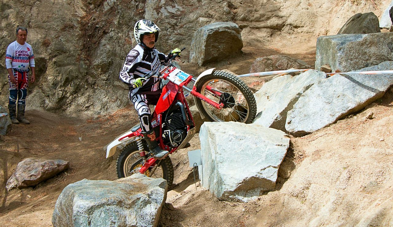 Mountain biker navigating rugged switchback on Enoch Trail