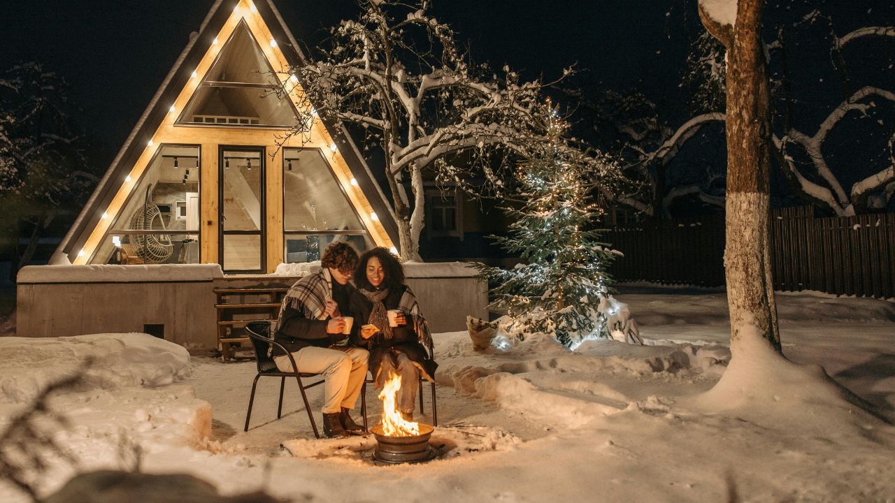 A Romantic Couple Sitting Outside at Night