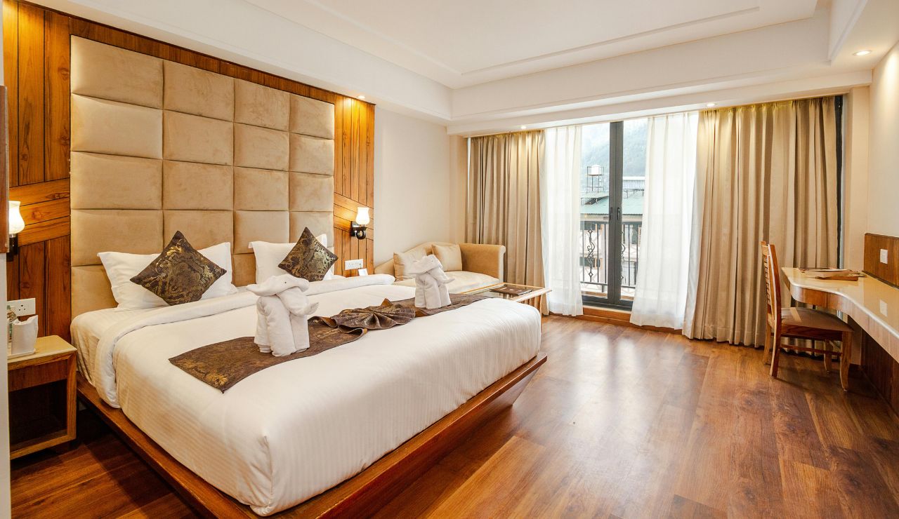Elegant hotel room with a large window and view